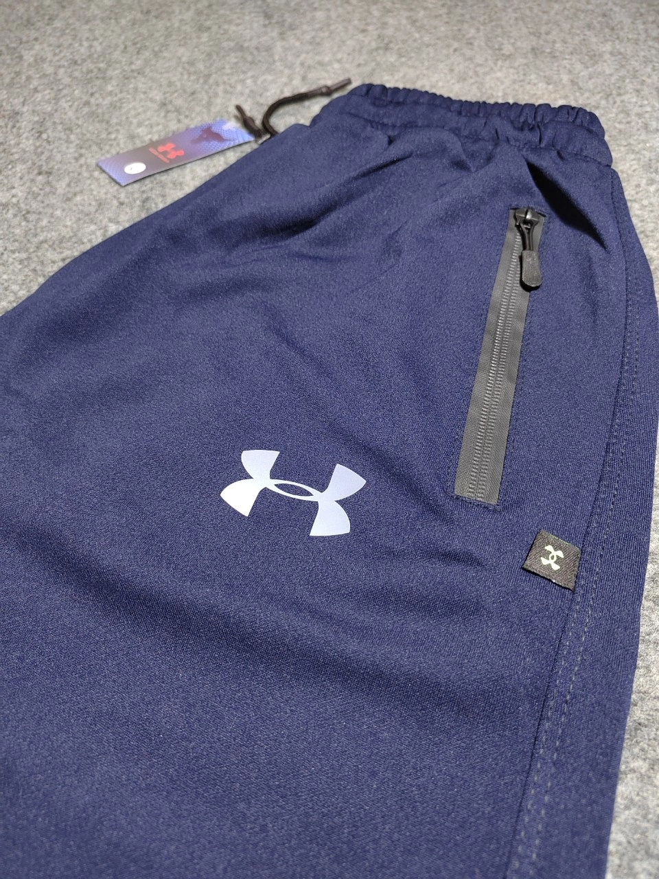 خرید شلوار اسلش UNDER ARMOUR دمپا گت